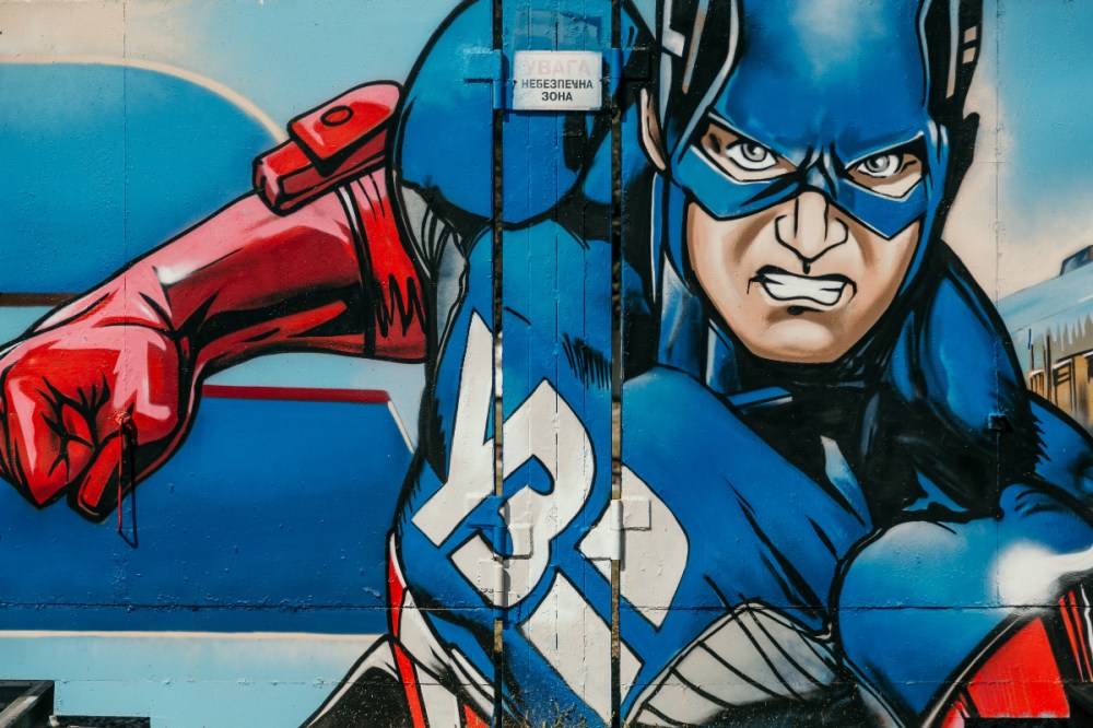 Street graffiti showing captain America in an action pose