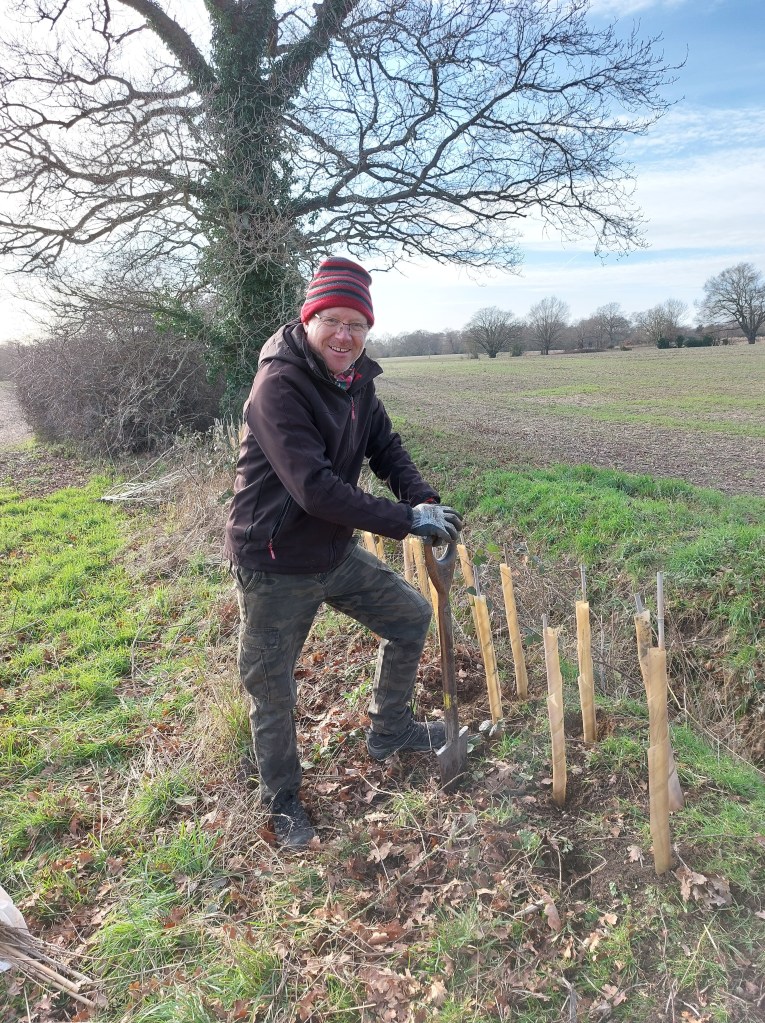 Terry busy at work planting trees